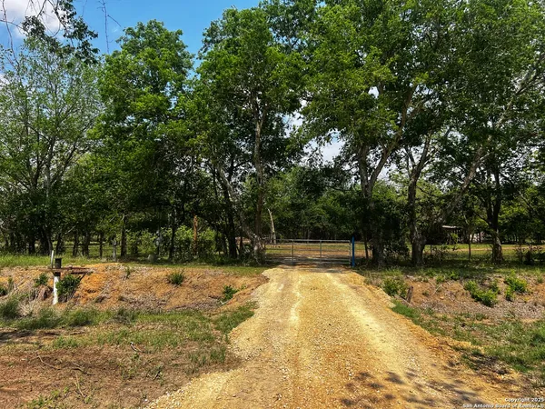 a swimming pool with wooden fence