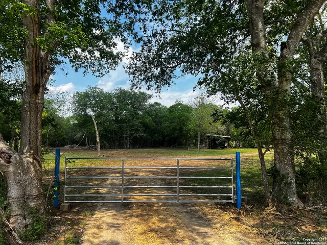 a swimming pool with wooden fence