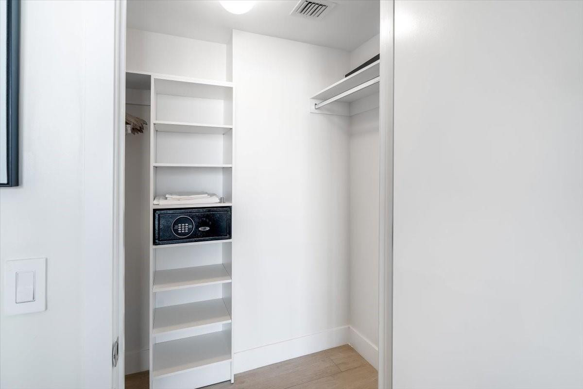 4010 South Ocean Drive, Unit R1102 Hollywood, FL 33019 - Photo 26 of 47 a view of a walk in closet with clothes