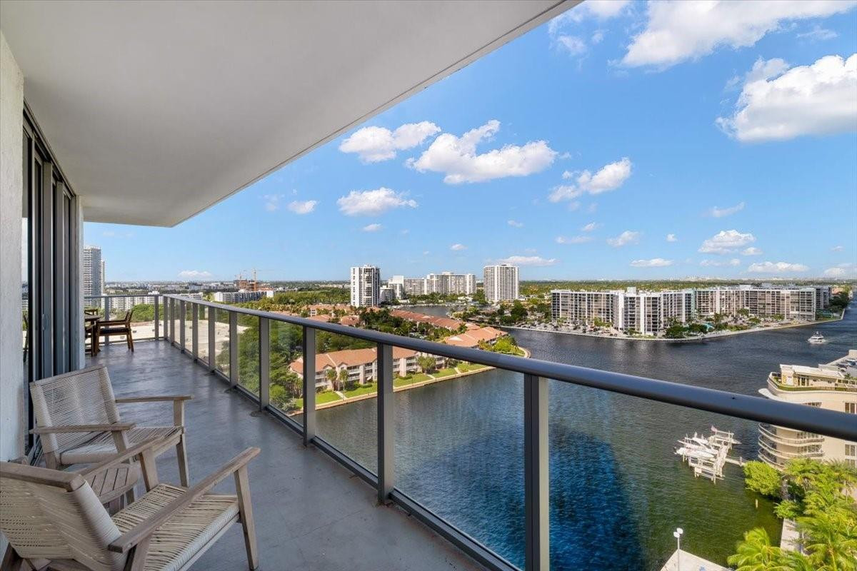 4010 South Ocean Drive, Unit R1102 Hollywood, FL 33019 - Photo 7 of 47 a view of swimming pool with outdoor seating and city view