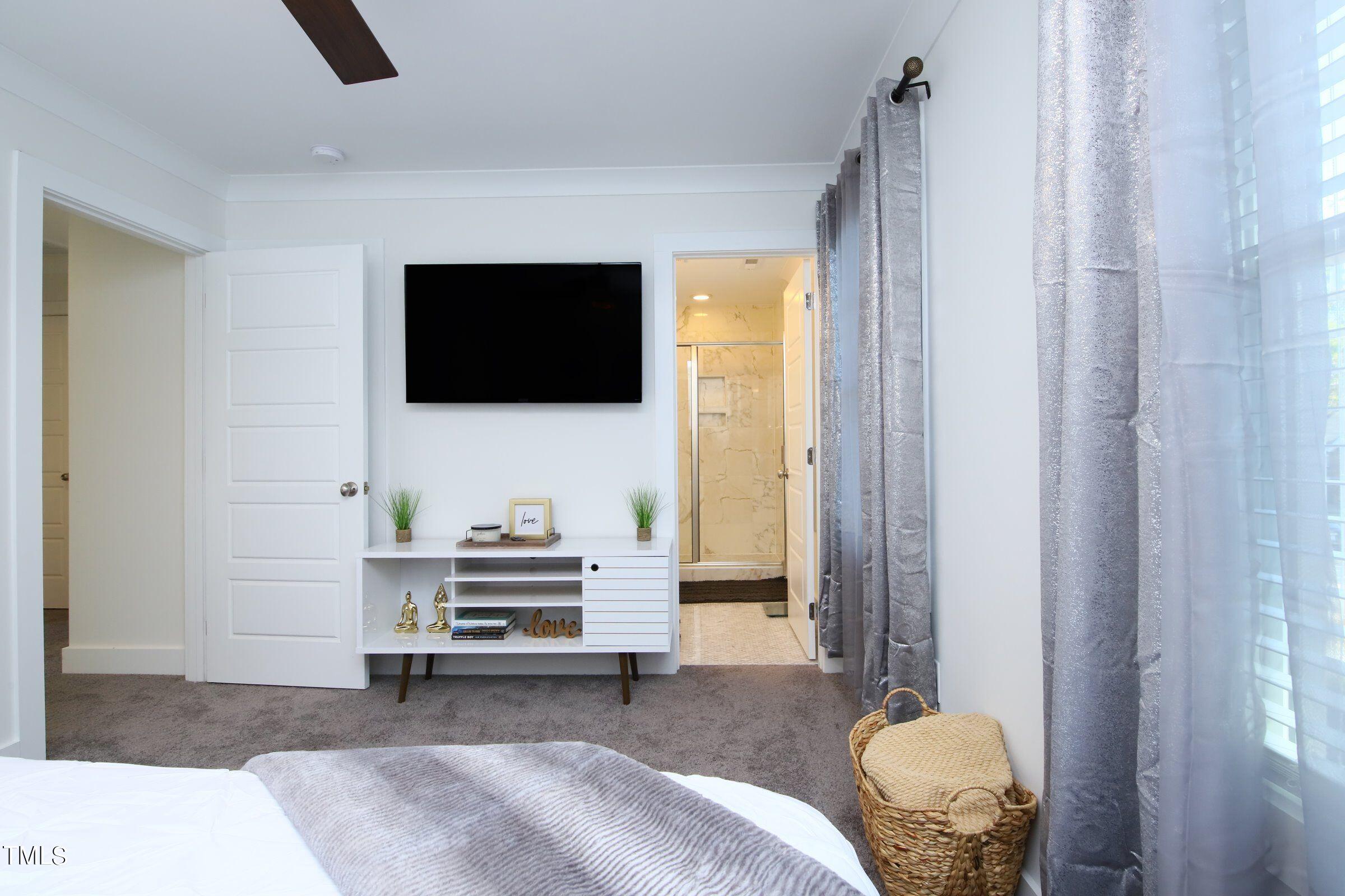 417 Como Drive Raleigh, NC 27610 - Photo 12 of 19 a living room with furniture and a flat screen tv