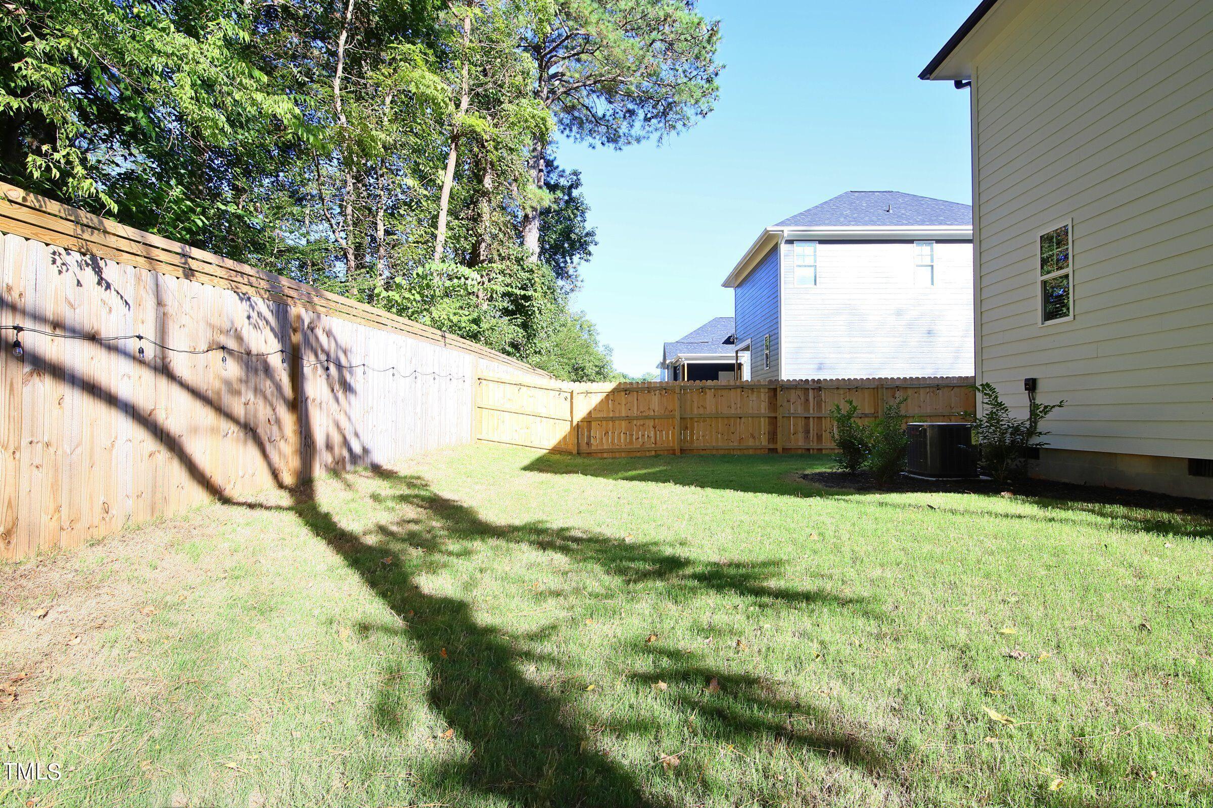 417 Como Drive Raleigh, NC 27610 - Photo 14 of 19 a view of backyard with swimming pool