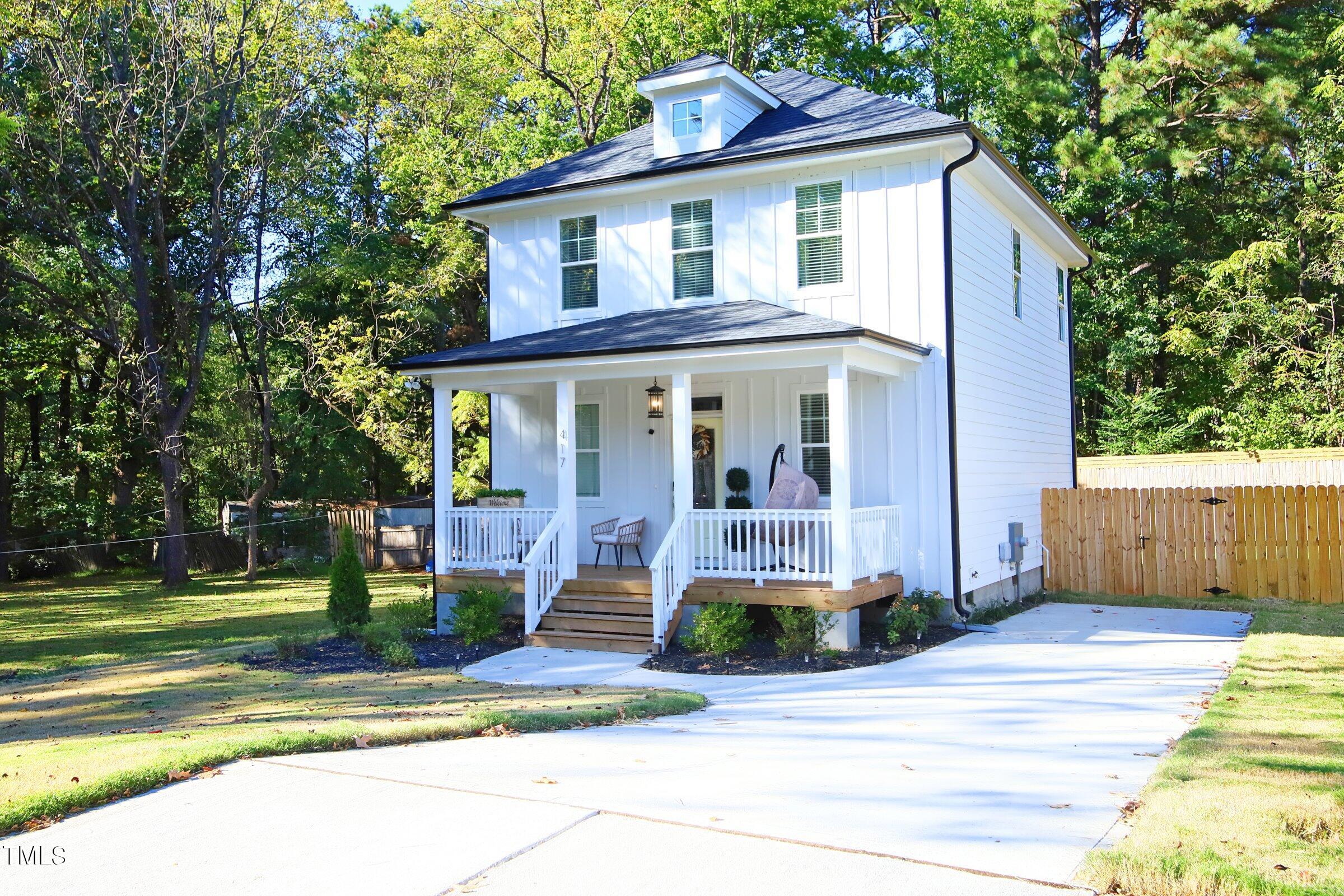 417 Como Drive Raleigh, NC 27610 - Photo 15 of 19 a front view of a house with a yard