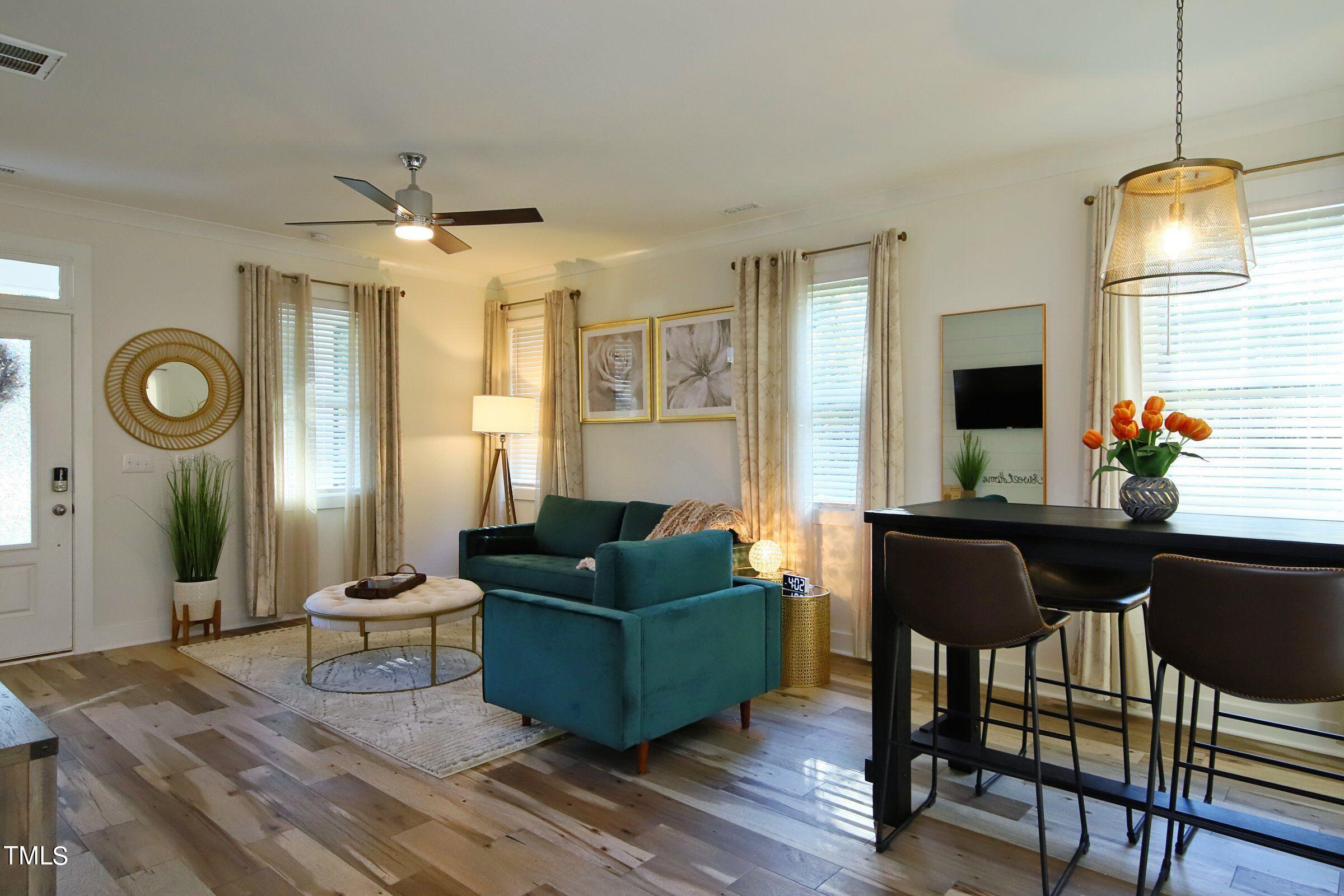 417 Como Drive Raleigh, NC 27610 - Photo 4 of 19 a living room with furniture and a window
