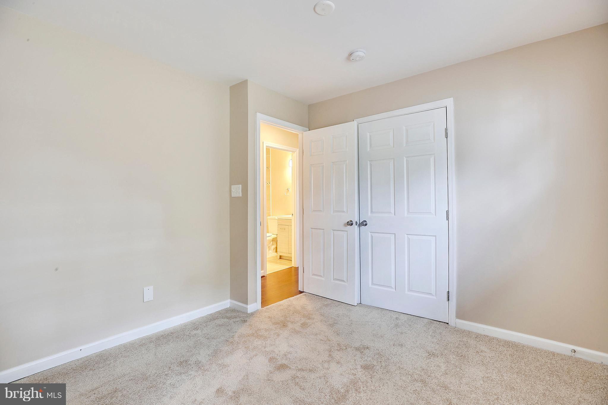 1718 Newcastle Road Baltimore, MD 21244 - Photo 8 of 9 a view of an empty room and closet area