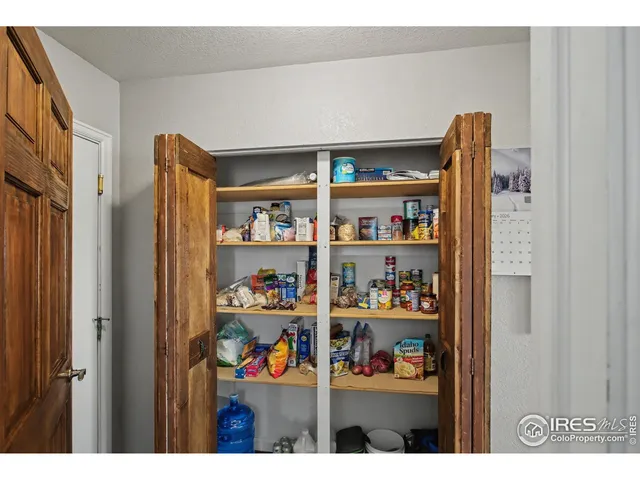 a living room with furniture and window