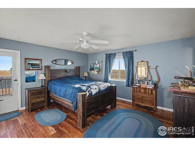 a view of a balcony with wooden floor