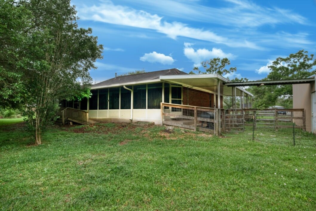 308 County Road 893B Angleton, TX 77515 - Photo 37 of 41 a view of a house with backyard