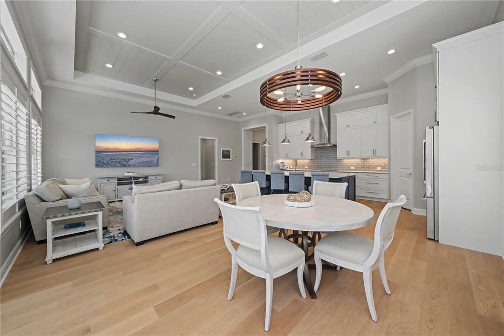 16620 Collingtree Crossing Lakewood Ranch, FL 34202 - Photo 11 of 48 a view of a dining room with furniture