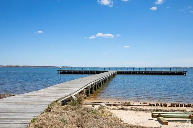 a view of a balcony with ocean view