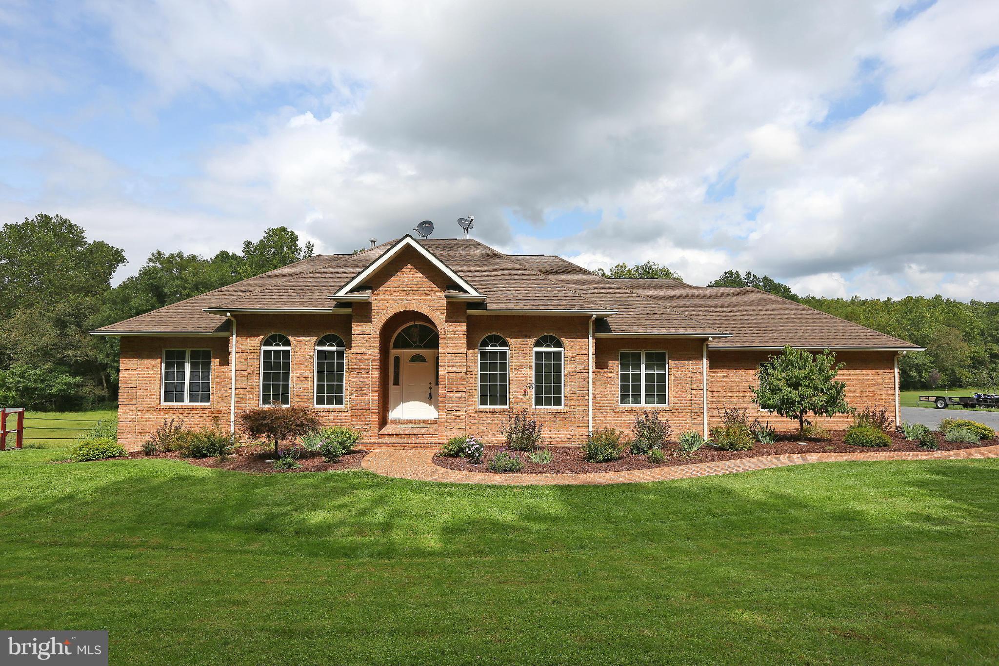 9360 Slate Quarry Road Dickerson, MD 20842 - Photo 1 of 27 a front view of house with yard and green space