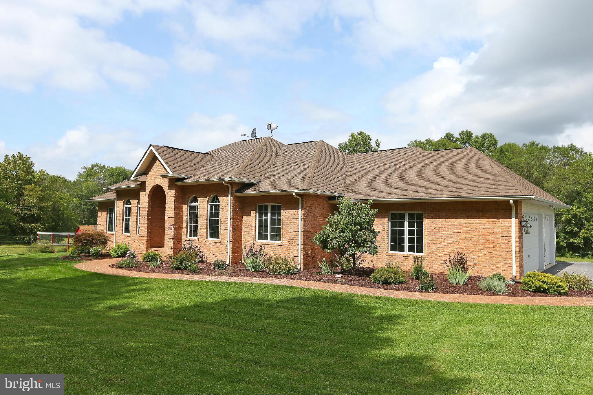 9360 Slate Quarry Road Dickerson, MD 20842 - Photo 2 of 27 a front view of a house with a yard