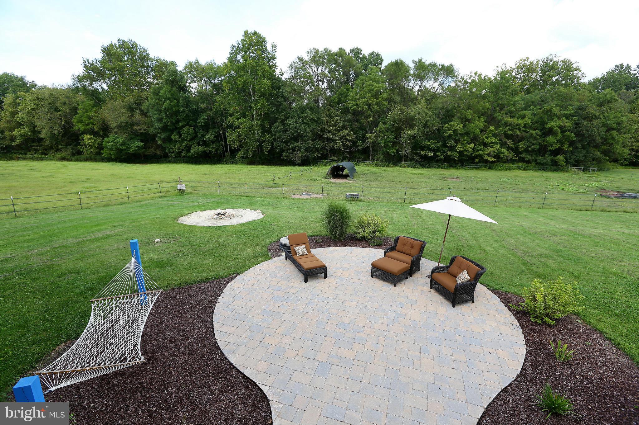 9360 Slate Quarry Road Dickerson, MD 20842 - Photo 24 of 27 a view of a garden with sitting area