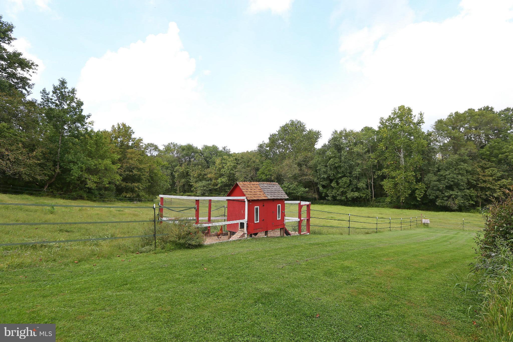 9360 Slate Quarry Road Dickerson, MD 20842 - Photo 26 of 27 a view of outdoor space with green field and trees