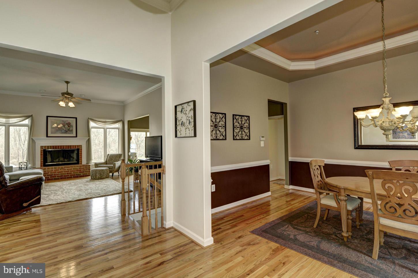 9360 Slate Quarry Road Dickerson, MD 20842 - Photo 4 of 27 a view of a livingroom with furniture and a flat screen tv