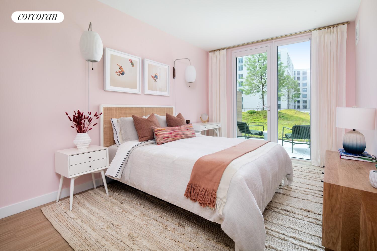 30-77 Vernon Boulevard, Unit 622W Queens, NY 11106 - Photo 3 of 8 a bedroom with a bed and large windows