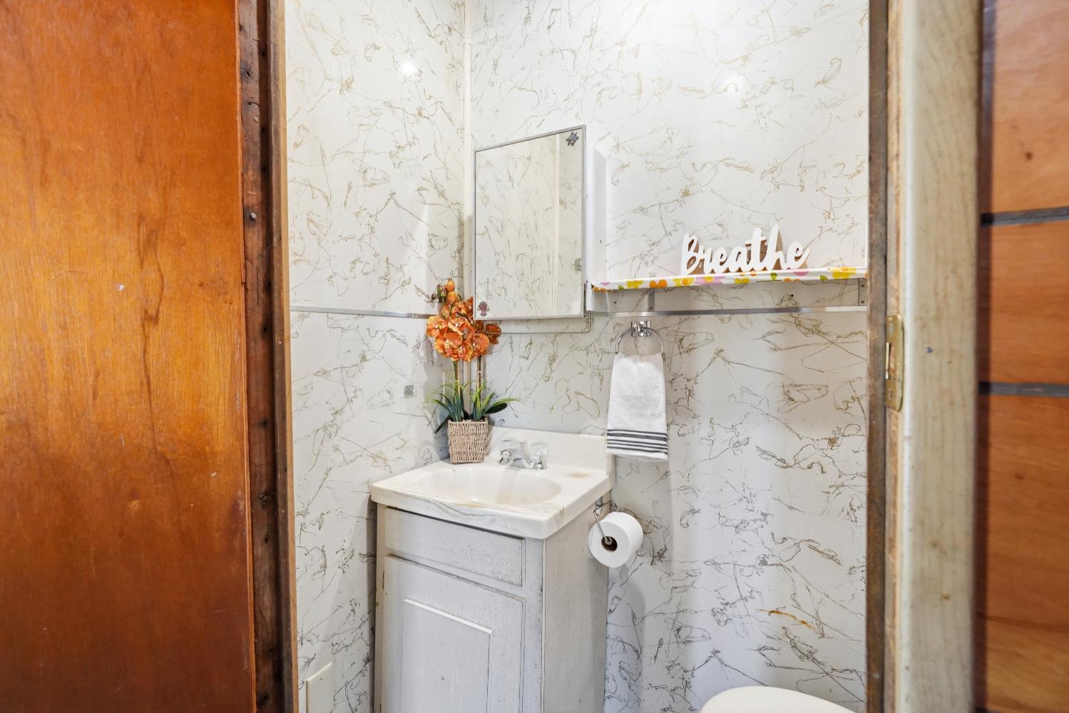 13351 Newtown Road Nevada City, CA 95959 - Photo 10 of 50 a bathroom with a sink and a mirror