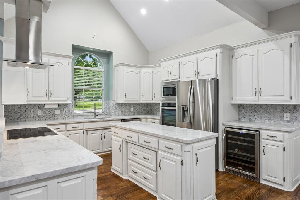 1309 Meadow Ridge Court Southlake, TX 76092 - Photo 9 of 34 Marble Counters, Stainless Steel Appliances.