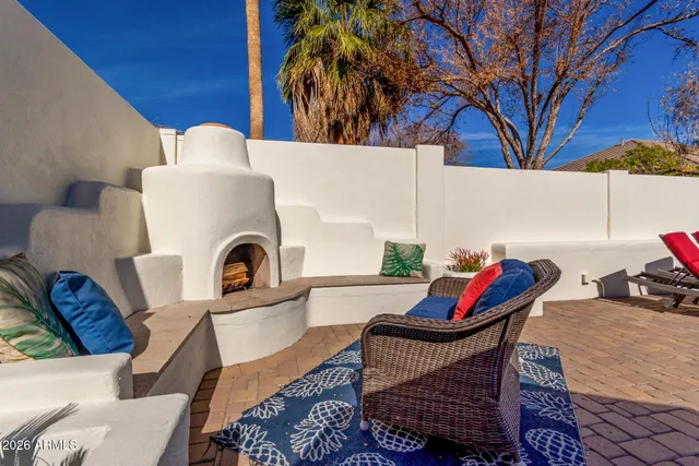 a chairs and table in a patio
