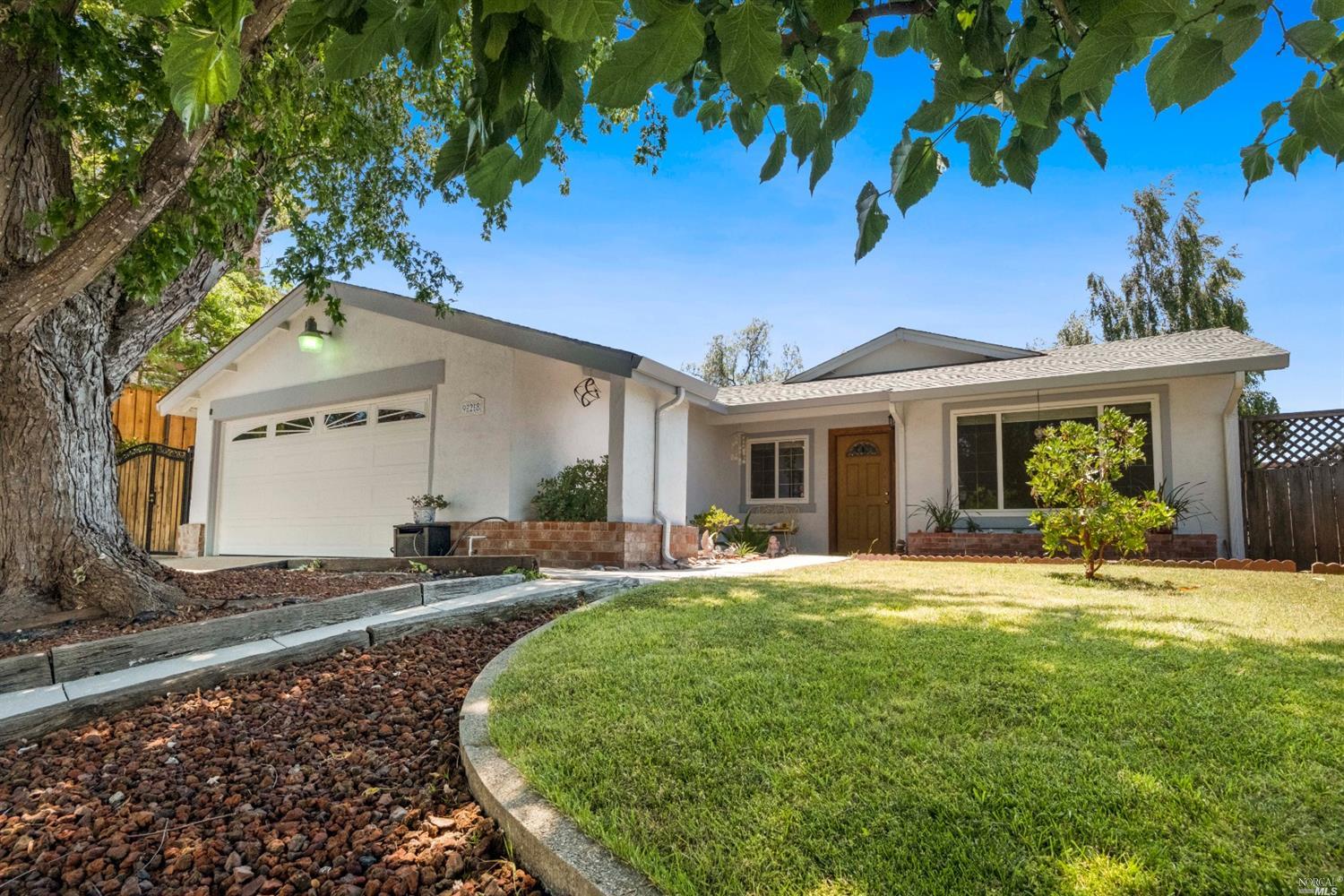 928 Springwood Court Rodeo, CA 94572 - Photo 1 of 1 a front view of a house with a garden and yard