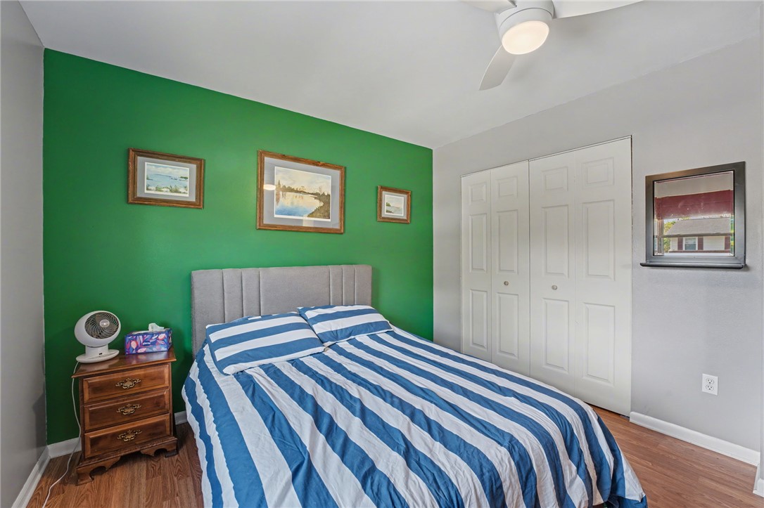 4919 Silver Arrow Drive Riverside, OH 45424 - Photo 27 of 57 This cozy bedroom features a refreshing accent wall, creating a vibrant and inviting atmosphere.