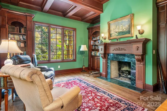 a bedroom with furniture and a fireplace