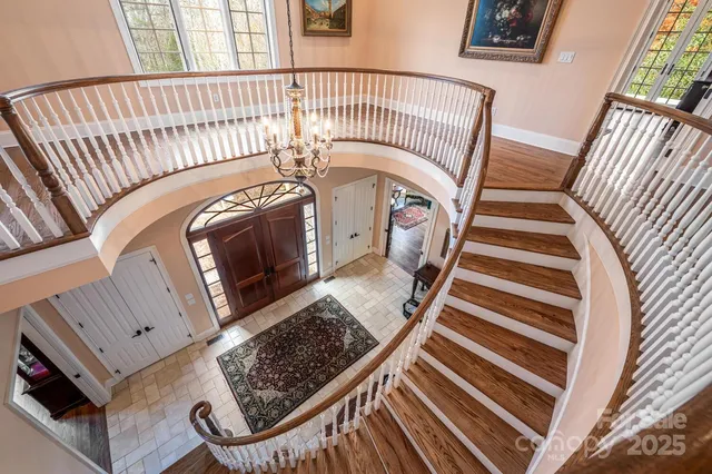 a view of entryway with wooden floor