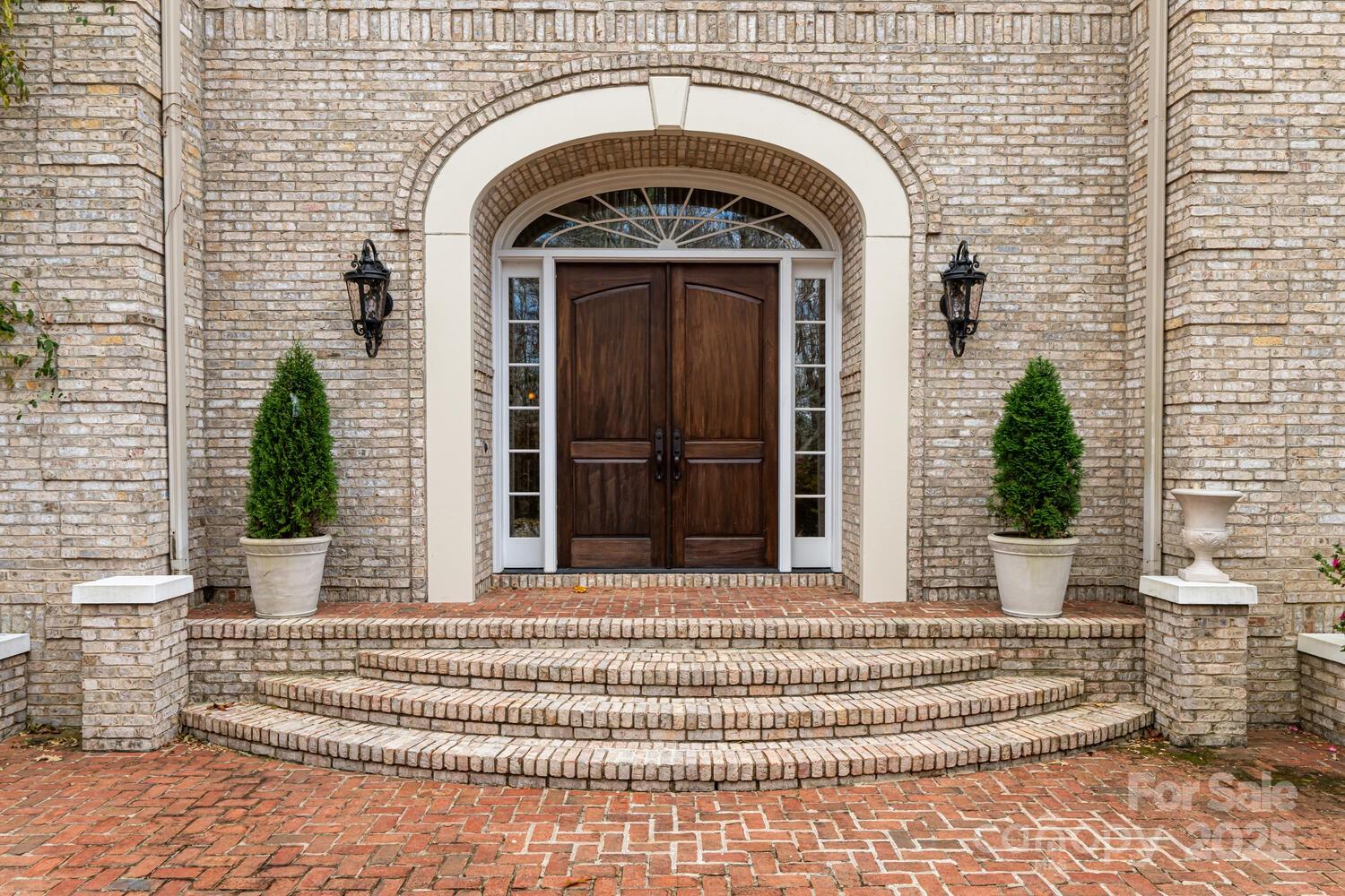 150 Rainbow View Drive Fletcher, NC 28732 - Photo 3 of 48 a front view of a house with a garden