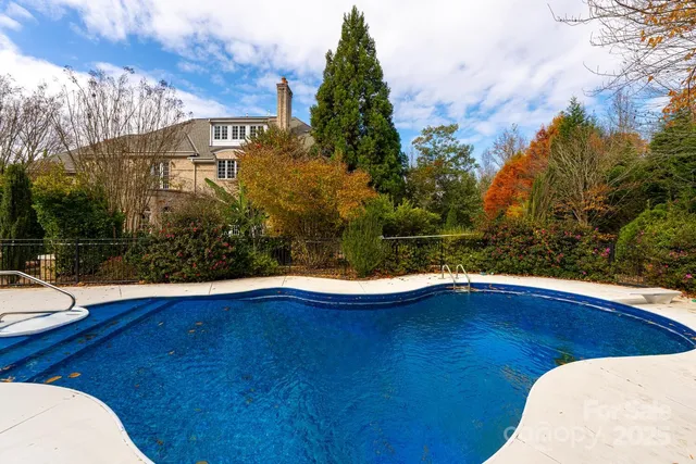 a view of outdoor space with swimming pool
