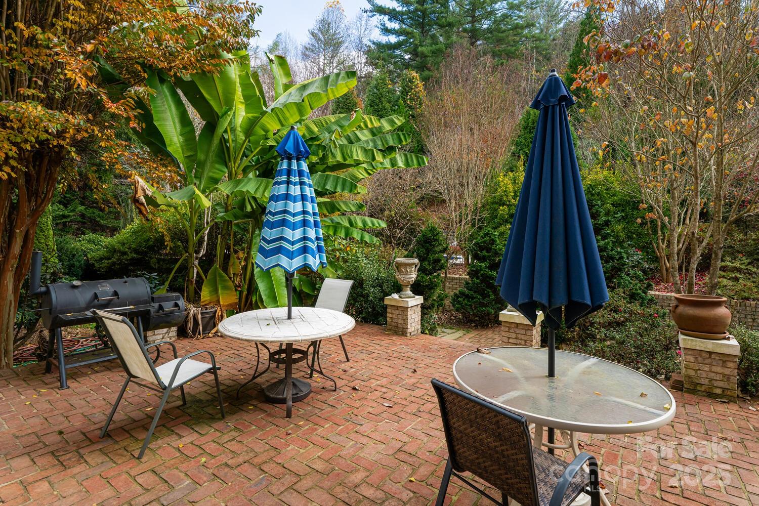 150 Rainbow View Drive Fletcher, NC 28732 - Photo 43 of 48 a backyard of a house with table and chairs
