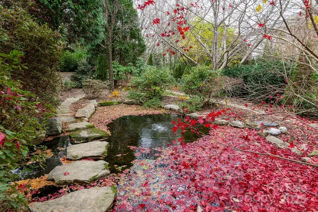 a view of a pathway with a yard