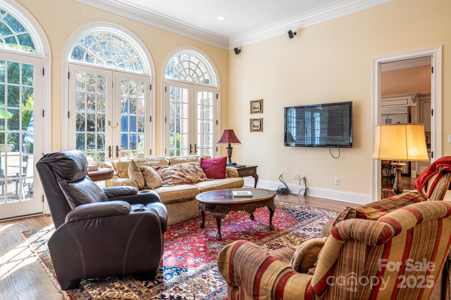 150 Rainbow View Drive Fletcher, NC 28732 - Photo 6 of 48 a living room with furniture fireplace and a large window