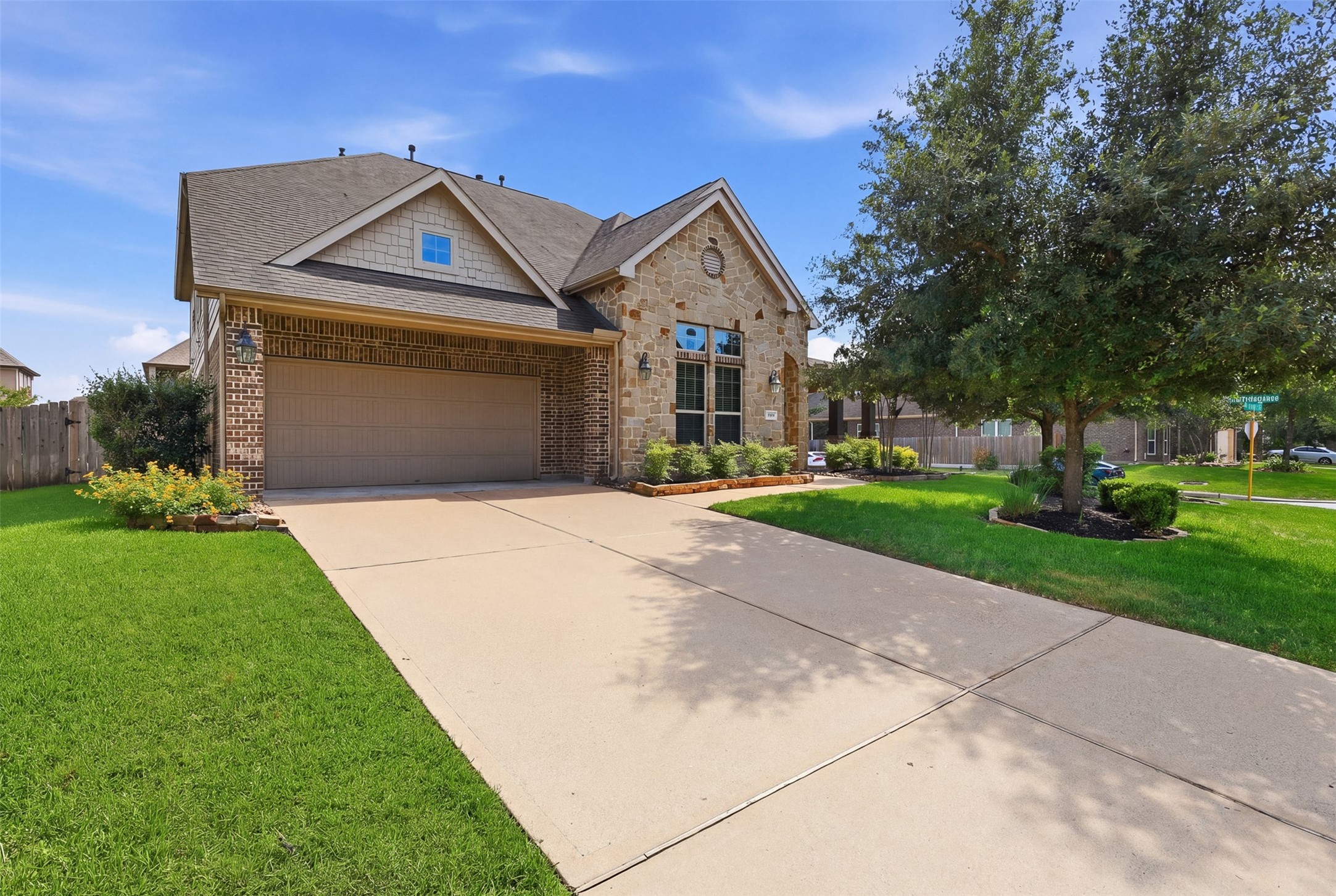 6835 Preston Grove Drive Spring, TX 77389 - Photo 3 of 49 a front view of a house with a yard and garage