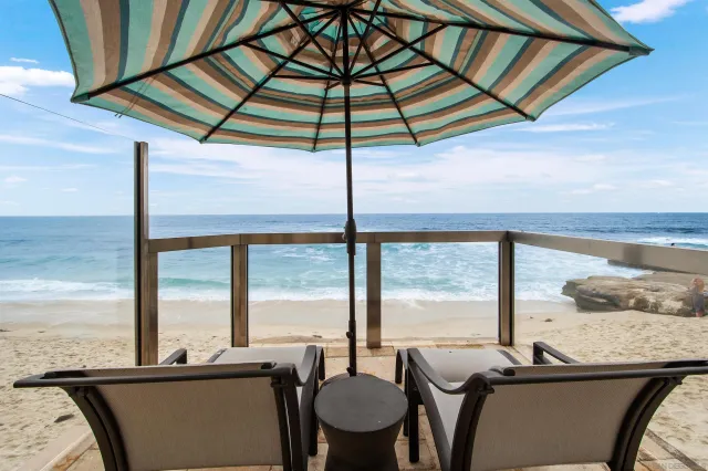 a view of living room with furniture and floor to ceiling window