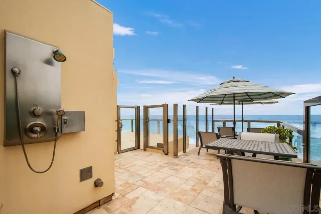 a view of ocean with large windows