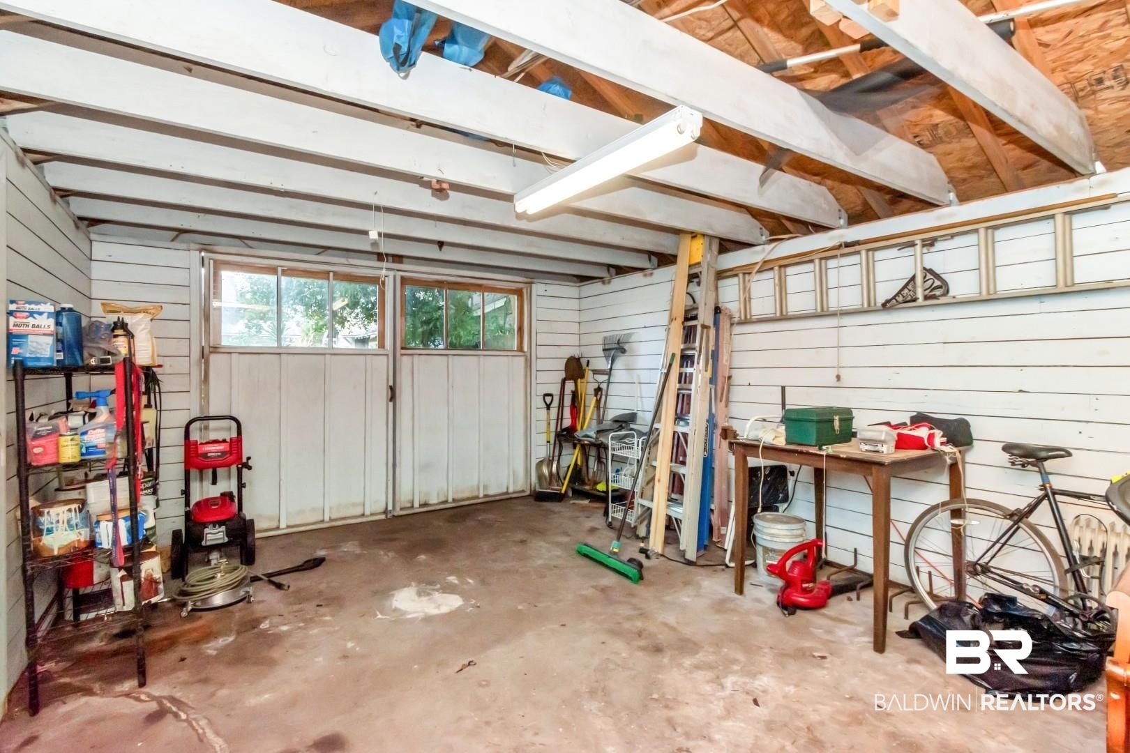 135 Silverwood Street Mobile, AL 36607 - Photo 27 of 32 Garage with wooden walls