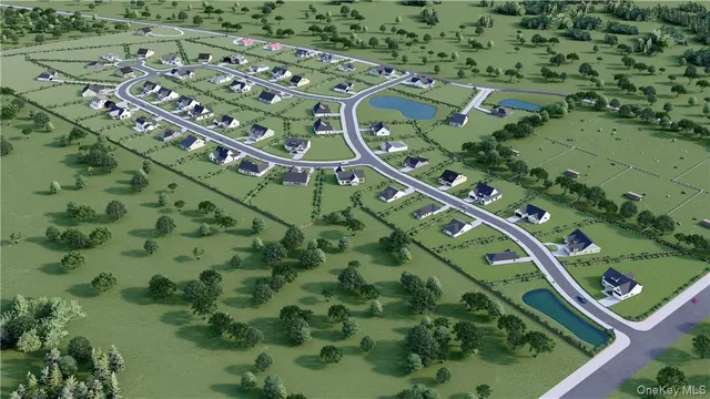 an aerial view of a residential houses with outdoor space