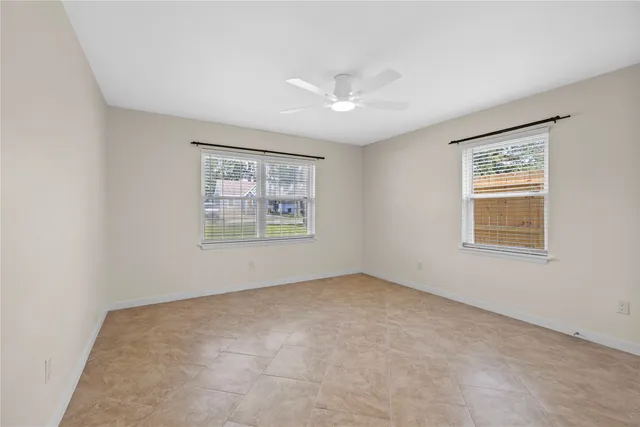 an empty room with windows