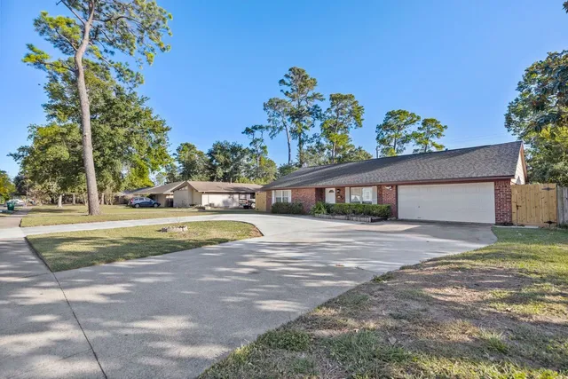 a view of a house with a swimming pool