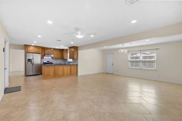 a view of a kitchen with a sink