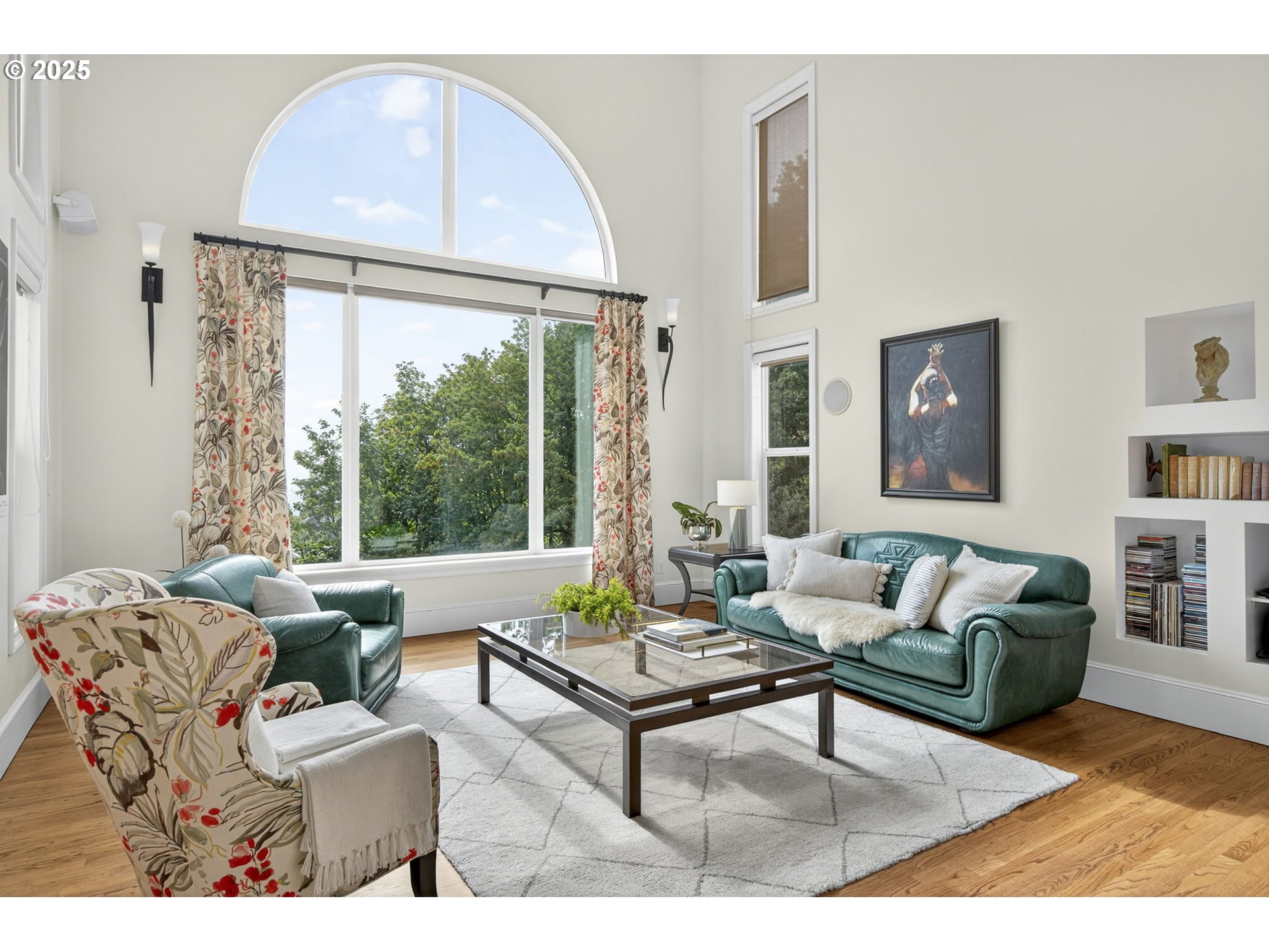 8452 Northwest Timber Ridge Court Portland, OR 97229 - Photo 11 of 48 a living room with furniture and a large window