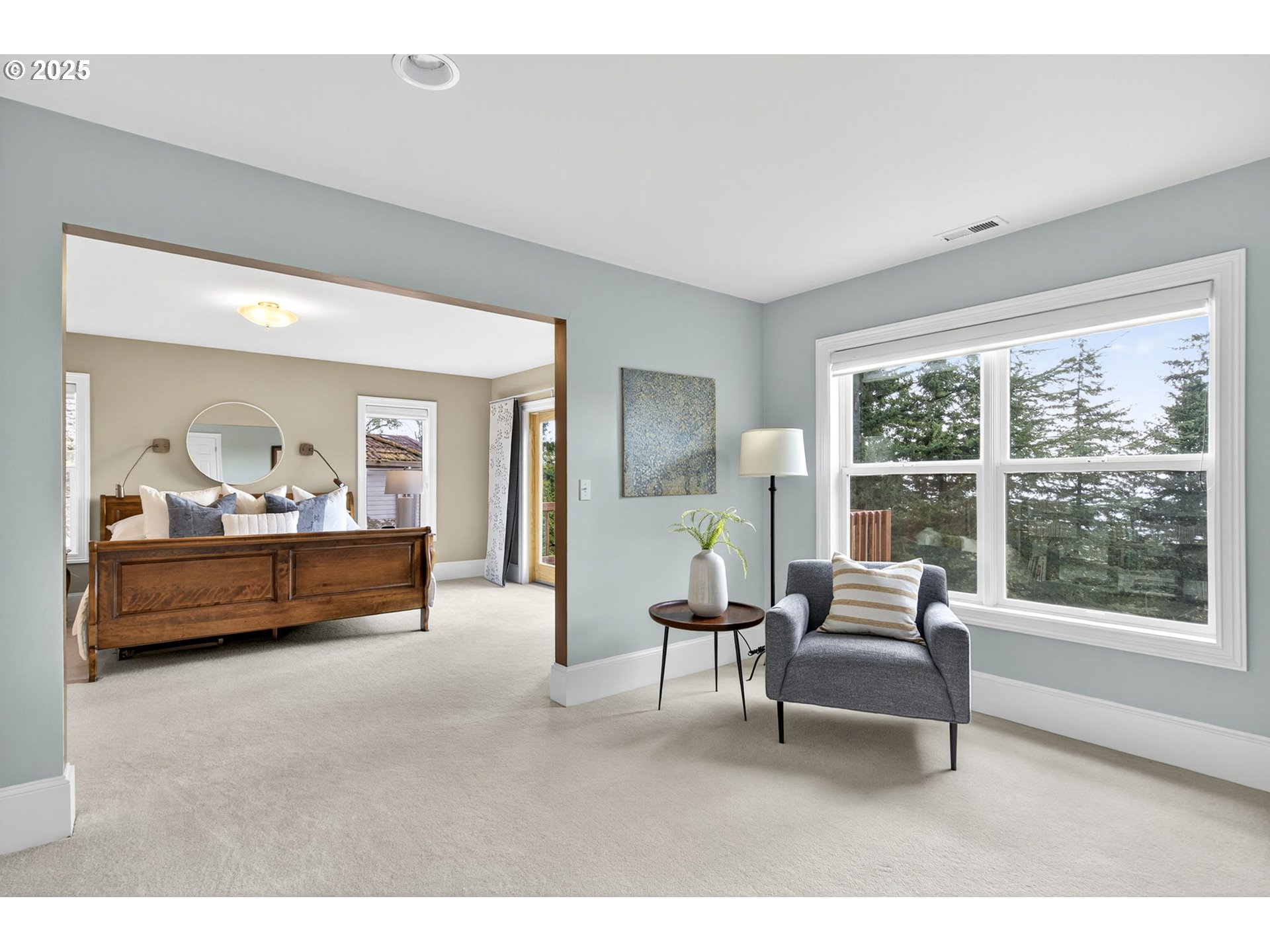 8452 Northwest Timber Ridge Court Portland, OR 97229 - Photo 23 of 48 a living room with furniture and a large window