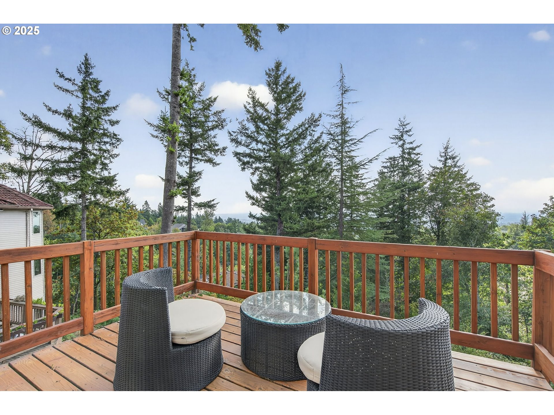 8452 Northwest Timber Ridge Court Portland, OR 97229 - Photo 30 of 48 a view of a chair and table on the roof deck