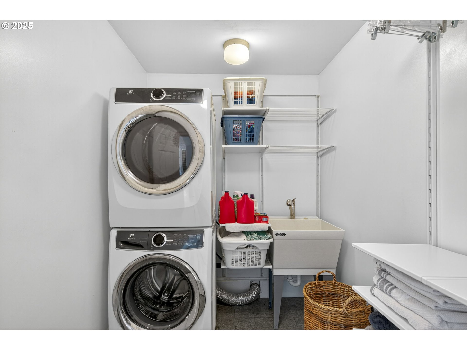 8452 Northwest Timber Ridge Court Portland, OR 97229 - Photo 34 of 48 a utility room with sink dryer and washer
