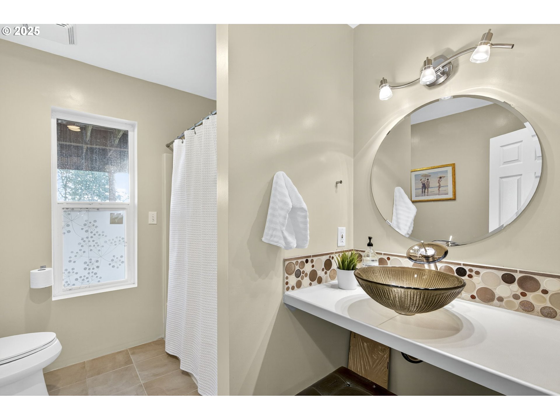 8452 Northwest Timber Ridge Court Portland, OR 97229 - Photo 44 of 48 a bathroom with a sink and a mirror
