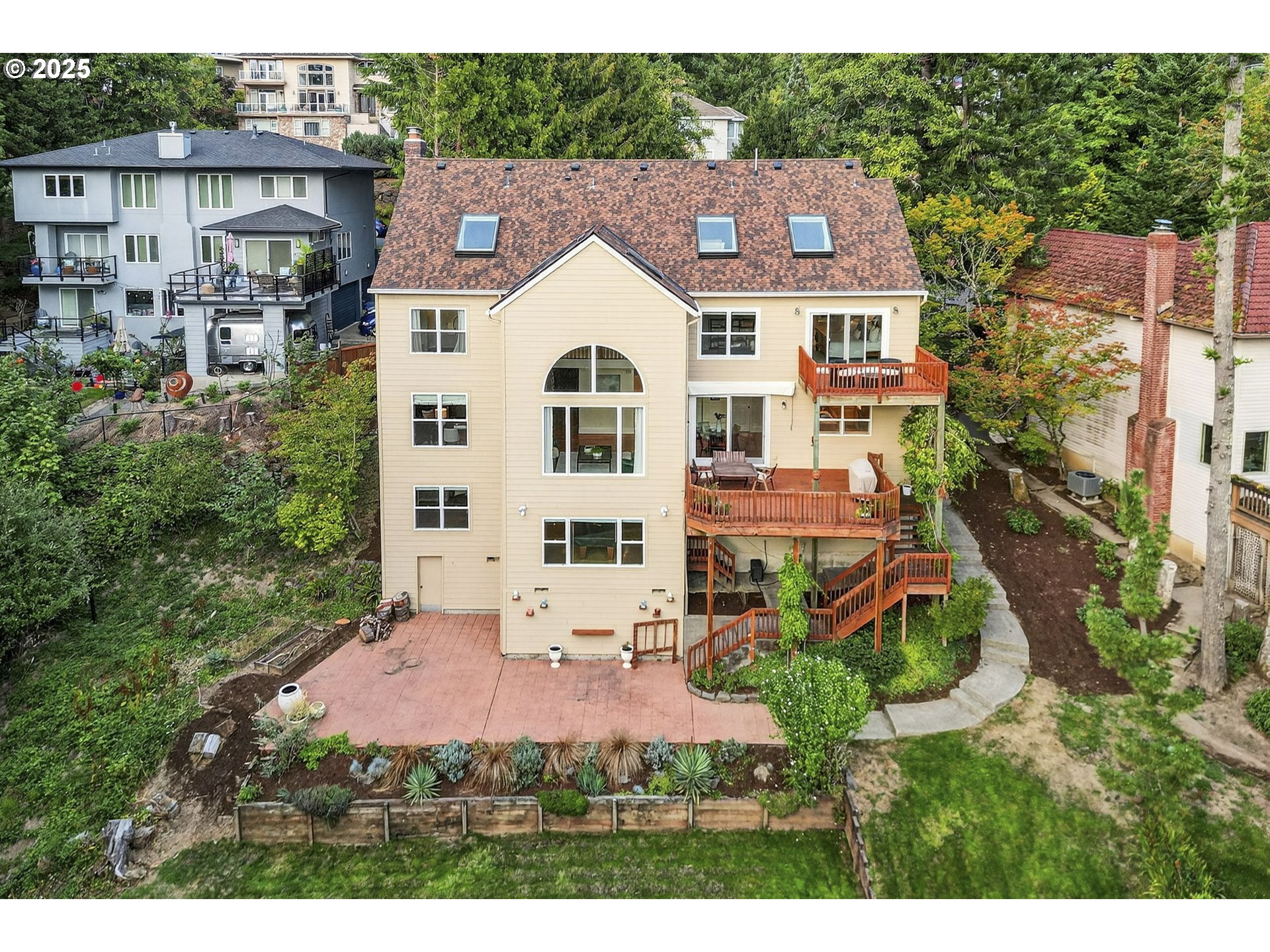 8452 Northwest Timber Ridge Court Portland, OR 97229 - Photo 45 of 48 a aerial view of a house with a yard