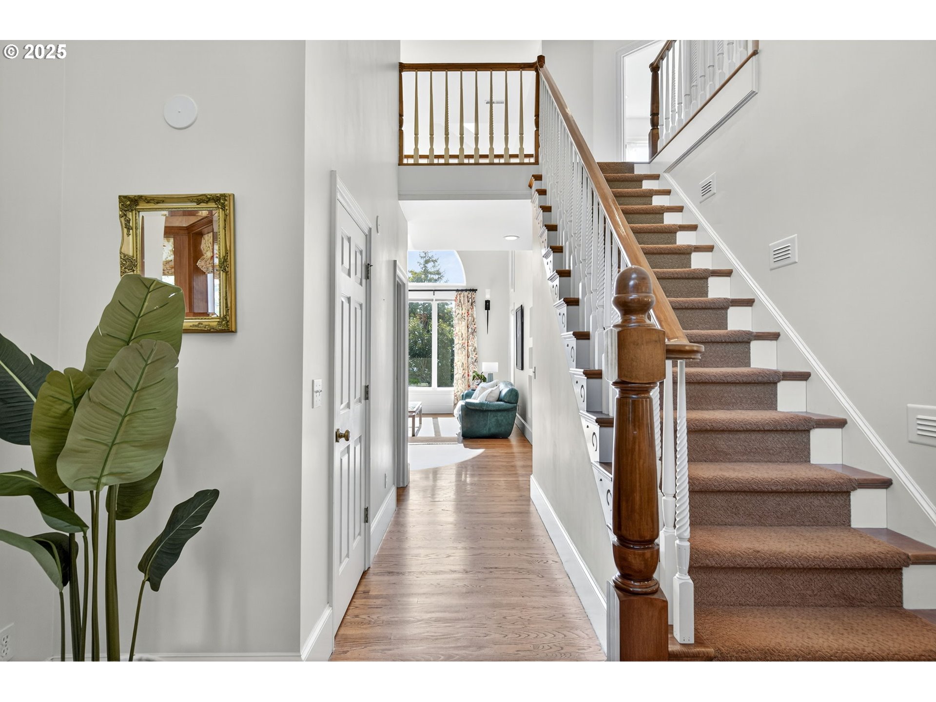 8452 Northwest Timber Ridge Court Portland, OR 97229 - Photo 5 of 48 a view of entryway and hall with wooden floor