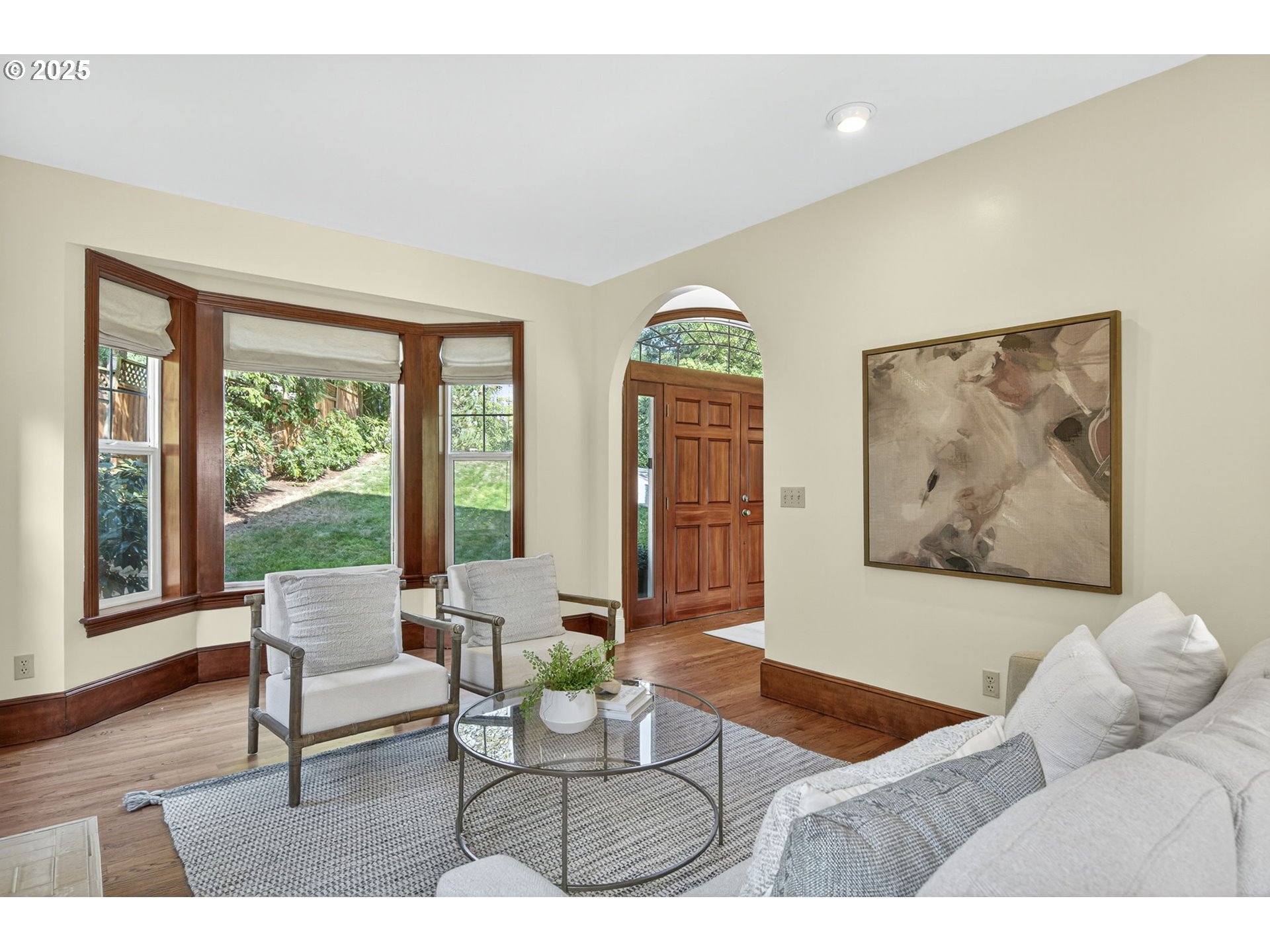 8452 Northwest Timber Ridge Court Portland, OR 97229 - Photo 6 of 48 a living room with furniture and a large window