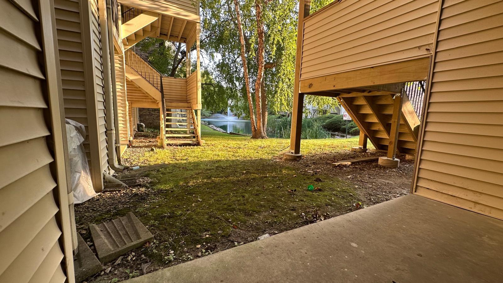 201 North Waters Edge Drive, Unit 101 Glendale Heights, IL 60139 - Photo 2 of 4 a view of a backyard door