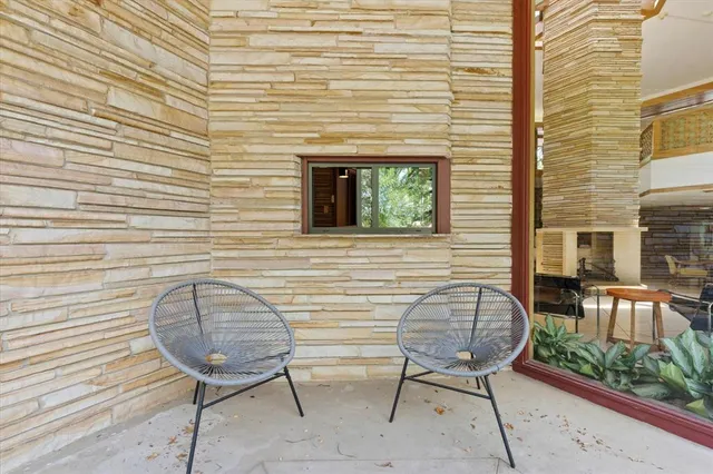 a view of a swimming pool with a yard